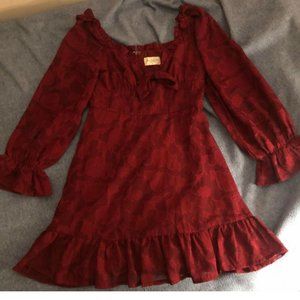 Long-Sleeved Red Dress with Bow Front from Urban Outfitters